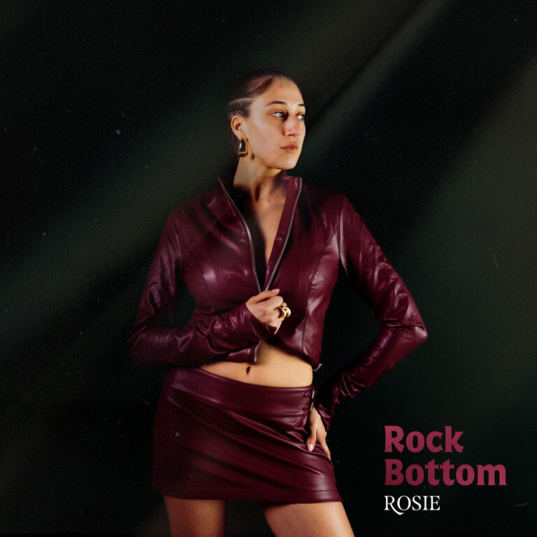 ROSIE celebrates where she is today on “Rock Bottom”